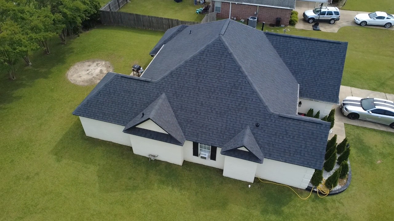 A finished Cloud Nine roof on a white house in Oxford, from the drone